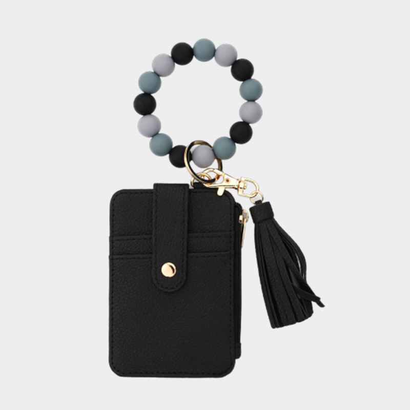 Plånbok i läder med pärlor