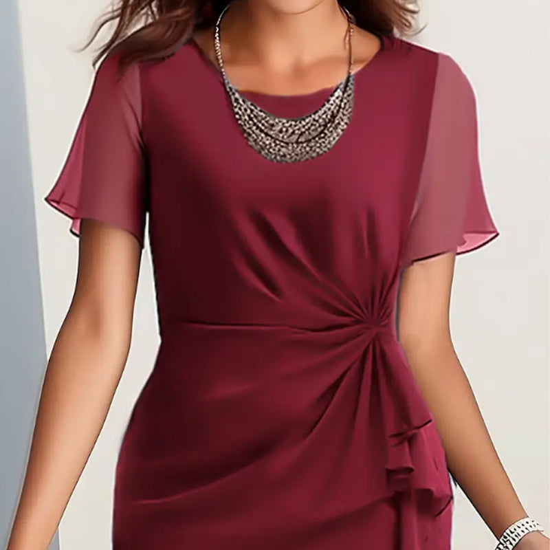 đElegant enfĂ€rgad klĂ€nning