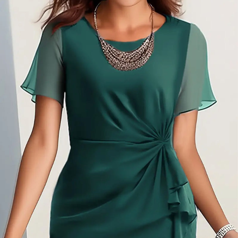 đElegant enfĂ€rgad klĂ€nning
