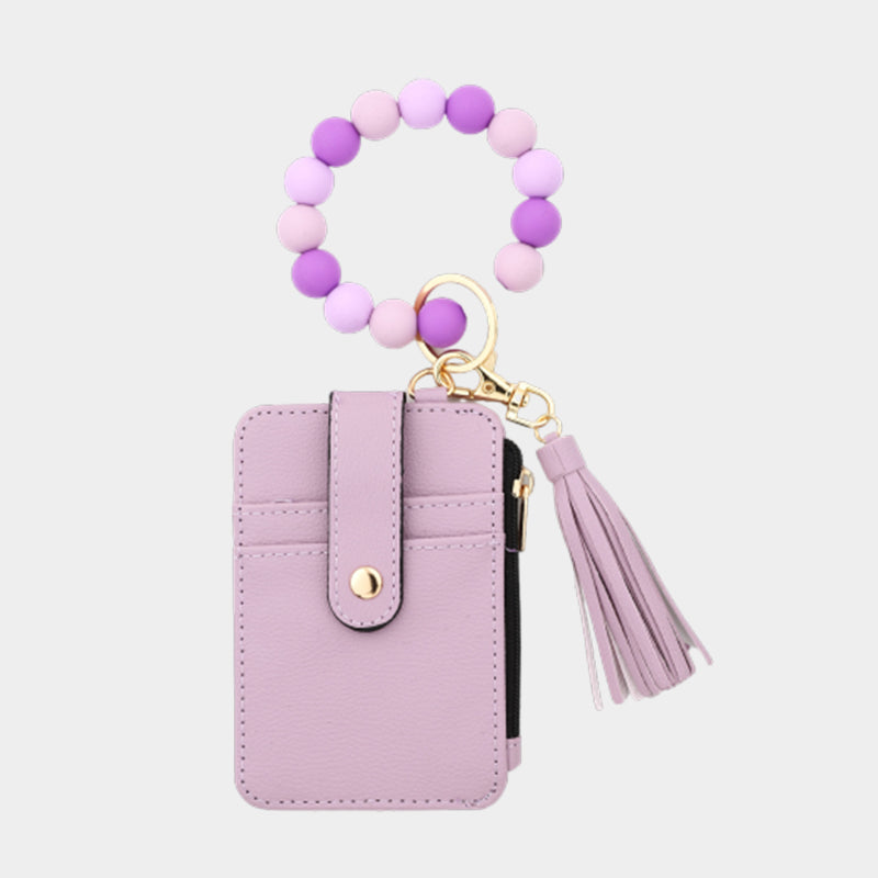 Plånbok i läder med pärlor