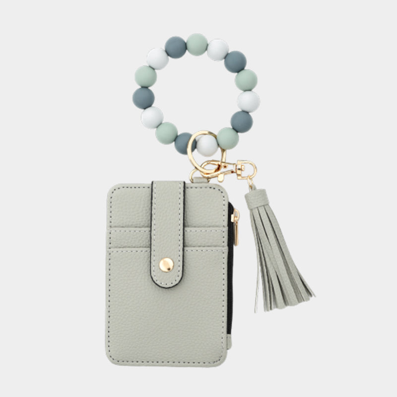 Plånbok i läder med pärlor