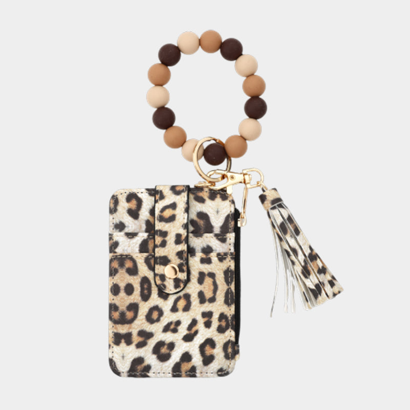 Plånbok i läder med pärlor