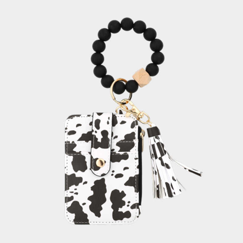 Plånbok i läder med pärlor