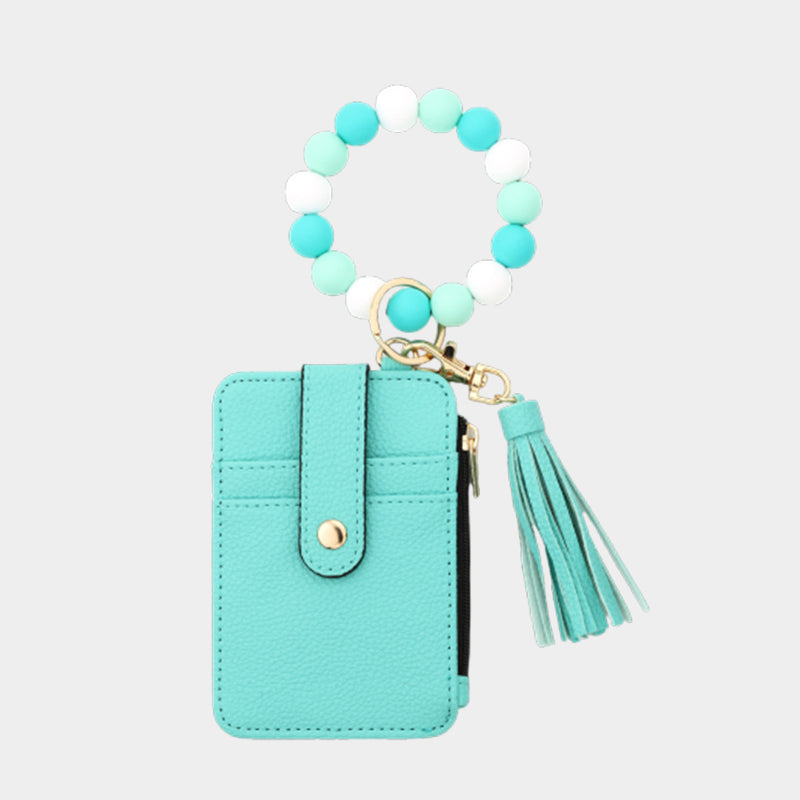 Plånbok i läder med pärlor